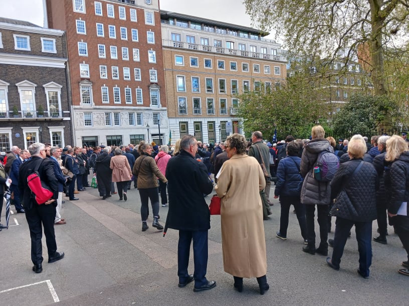 The memorial crowd gathers
